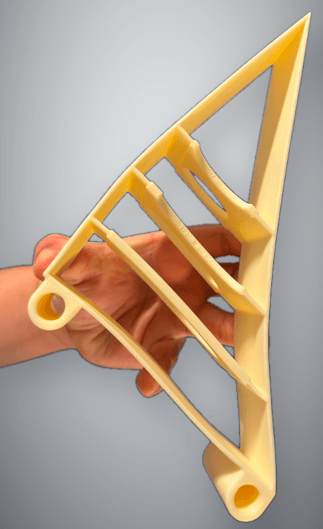 The topology-optimized gripper finger printed in PLA